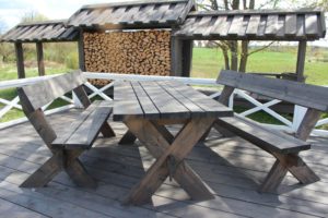 Garden table with detached benches